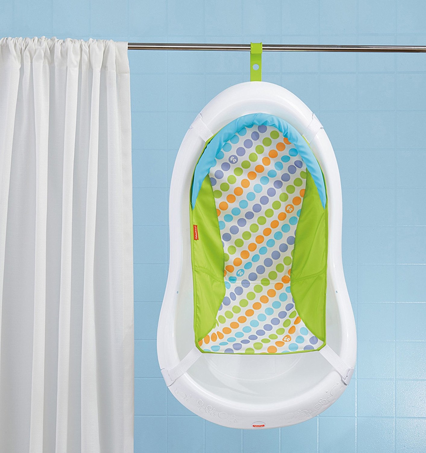 Fisher-Price 4-in-1 Sling N Seat Tub hanging from shower to dry