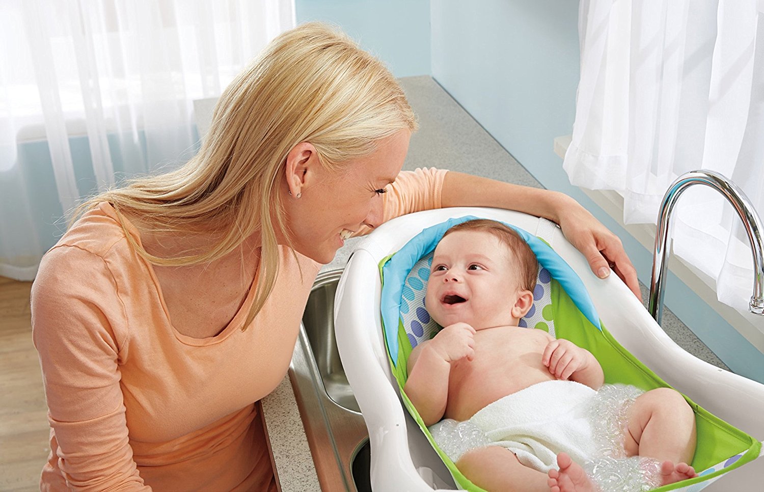 Fisher-Price 4-in-1 Sling N Seat Tub newborn in sling close up