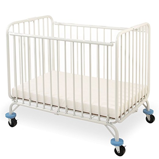 L.A. Baby Deluxe Holiday Folding Metal Crib , White side view