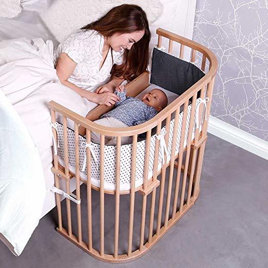 baby bed attached to bed